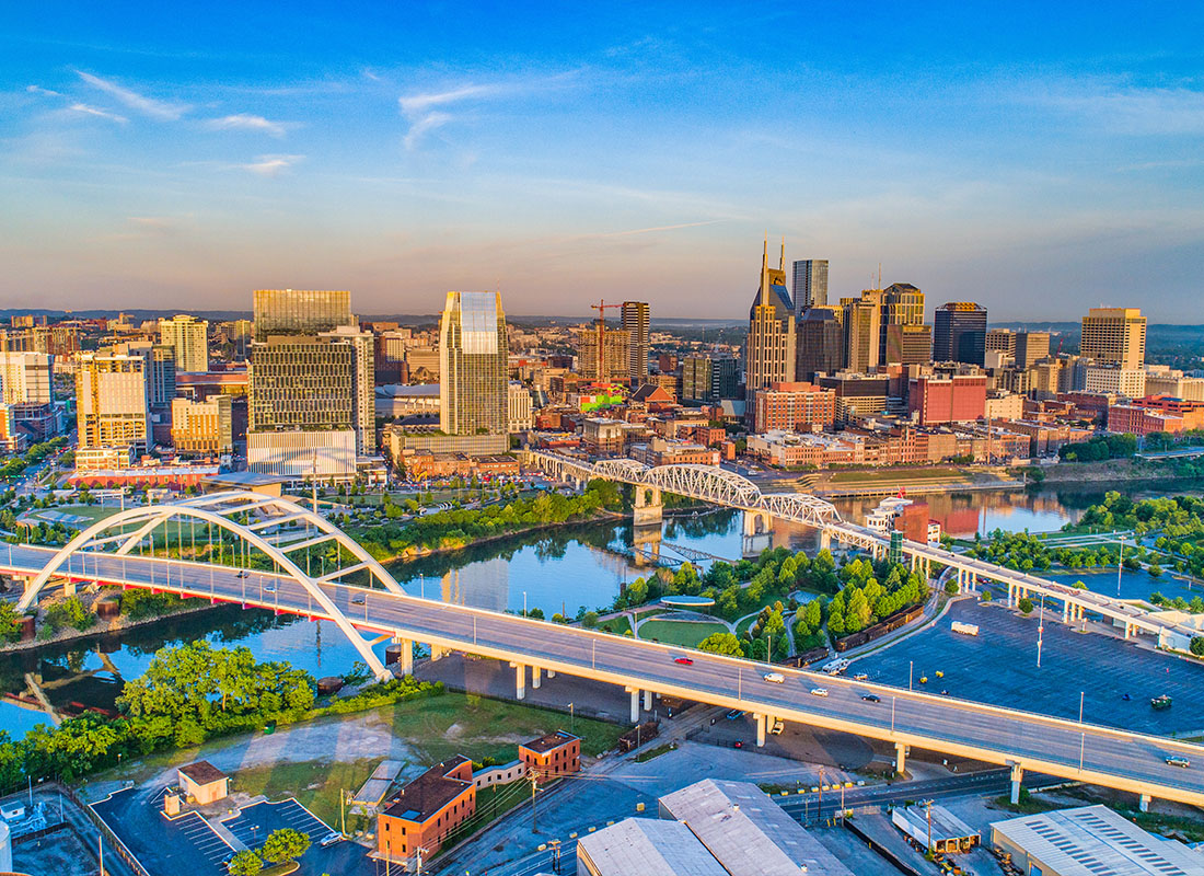 Contact - Aerial View of Downtown Nashville, Tennessee During Sunset
